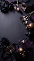 Dark gothic Halloween table setting with copper cutlery, ornate masks, skulls and black roses on slate background for spooky dinner party decoration.