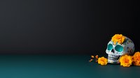 Decorative sugar skull with orange marigold flowers on dark teal background with copy space, Day of Dead celebration concept, Mexican holiday tradition.