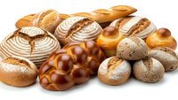Fresh baked bread assortment with artisan loaves, rolls and pastries isolated on white background for bakery menu design and culinary projects.