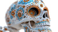 Decorative skull with intricate orange and blue floral patterns on white surface, featuring traditional Mexican folk art style ornamental designs and detailed mandala motifs.