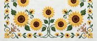 Vintage sunflower cross stitch embroidery pattern with decorative floral border design on fabric background for needlework and craft projects.