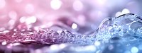 Macro photography of water drops with pink and blue bokeh background creating dreamy abstract texture with light reflections and crystalline formations.