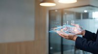 Business professional holding holographic digital technology interface with data visualization in modern office environment for innovation presentations.
