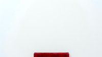 Isolated dark red velvet rectangular box on white background, suitable for product mockups, packaging design, and commercial applications.