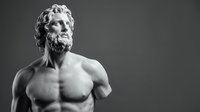 Male classical statue with muscular physique and curly beard, monochrome studio portrait against neutral background. Suitable for art, history, and educational content.