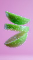 Fresh lime wedges with water drops floating on pink background, levitating citrus slices with splashing droplets create dynamic composition for beverage advertising.