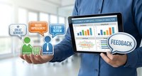 Business professional holding tablet displaying customer satisfaction analytics dashboard with colorful charts and feedback metrics for service improvement.