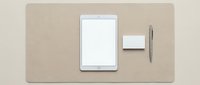 White tablet computer with blank screen, business cards and pen on beige textured surface for corporate branding mockup and professional presentation.