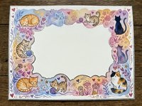 Decorative frame border with cute cats and floral elements on textured paper background for greeting cards, invitations and scrapbooking projects.