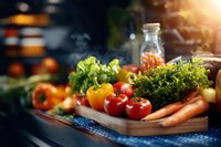 Fresh organic vegetables and herbs on wooden cutting board in rustic kitchen, sunlight through window creates warm atmosphere for healthy cooking.