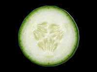 Fresh cucumber slice isolated on transparent background, ready for stickers, print on demand, T-shirt design, clipart, and sublimation projects.