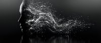 Digital particle explosion from human head profile showing data flow and artificial intelligence concept on black background.