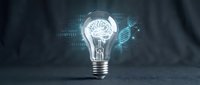 Light bulb with glowing brain inside surrounded by digital data streams and binary code representing artificial intelligence and innovation concepts.