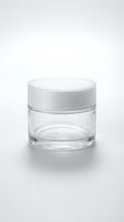 Empty glass cosmetic jar with white cap isolated on white background, suitable for skincare product packaging, beauty branding, and cosmetics mockup designs.