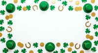 St. Patrick's Day festive frame with green hats, shamrocks, horseshoes and gold coins on white background. Holiday celebration border design.