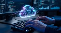 Digital cloud computing technology concept with glowing holographic cloud icon above laptop keyboard in modern tech workspace for business solutions.