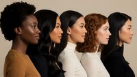 Diverse group of five women in profile showing different ethnicities and hairstyles representing multicultural beauty and unity in modern society.