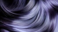 Luxurious purple hair strands with flowing waves and silky texture for beauty salon advertising and haircare product marketing campaigns.