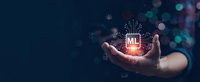 Machine learning concept with glowing ML chip hovering above open palm against dark tech background with digital network elements and data visualization.