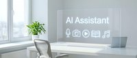 Modern office workspace with AI Assistant holographic display showing voice, camera, video, document and music icons on transparent screen above white desk.