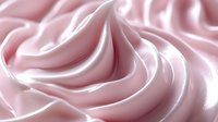 Smooth pink cream swirl with glossy texture for cosmetic and beauty product packaging design applications.