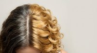 Professional hair coloring transformation showing blonde highlights on brunette hair with elegant curled styling for beauty salon marketing.