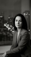 Professional businesswoman in suit posing confidently against urban city lights background. Corporate executive portrait in monochrome style for business concepts.