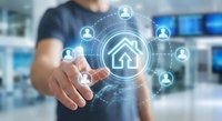 Professional man touching digital home icon with connected user network symbols representing smart home technology and real estate connectivity solutions.