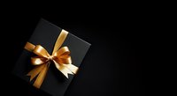Black gift box with golden ribbon bow on dark background, suitable for holiday promotions, luxury packaging design, and festive greeting cards.