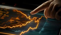 Finger touching glowing orange stock market chart on digital display screen, showing upward trend analysis and financial data visualization in dark setting.