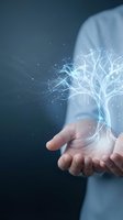 Person holding glowing digital tree with branching network lines and particles, representing innovation, technology, growth, and knowledge sharing for business concepts.