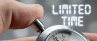 Caucasian male hand holding a stopwatch with glowing LIMITED TIME text, symbolizing urgency, deadline, and time-sensitive business offers.
