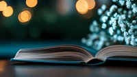 Open book with blurred bokeh lights and delicate white flowers in background creates magical reading atmosphere, soft focus photography for literature and education concepts.