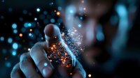 Magical glowing sparkles and light particles float around fingers in dark atmospheric setting with blue bokeh background creating mystical effect.