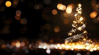 Glowing spiral Christmas tree with golden lights against dark bokeh background, creating festive holiday atmosphere.