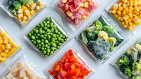 Frozen vegetables in plastic containers arranged on white background. Colorful mix of corn, peas, broccoli, peppers and other veggies for meal prep and cooking.