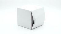 Damaged white cardboard box with a dent and crushed corner, isolated on white background. Concept of poor packaging, shipping damage, and fragile goods.