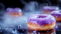 Purple glazed donuts with sparkling sugar coating on dark surface with bokeh lights creating magical bakery atmosphere for dessert photography.
