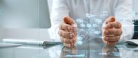Professional in white shirt holding digital network interface with glowing icons and data connections, representing business technology, cloud computing, and digital transformation solutions.