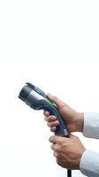 Professional hands holding modern handheld scanner device isolated on white background for business and technology applications.
