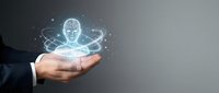 Businessman hand holding glowing digital brain hologram with network connections representing artificial intelligence and machine learning technology concepts.