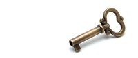 Antique brass skeleton key on white background, isolated vintage metal object with ornate bow detail for security and access concepts.