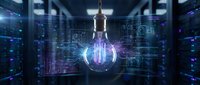 Glowing light bulb with digital circuits in modern data center server room representing innovation technology and bright ideas for business solutions.
