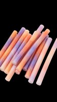 Colorful pastel candy sticks in orange and purple tones, isolated on transparent background, ready for stickers, clipart, t-shirt design, and print on demand use.
