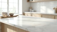 Modern kitchen interior with white marble countertop and wooden cabinets in bright natural light for home design and renovation projects.