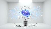 Light bulb with glowing blue brain and circuit board patterns inside, symbolizing artificial intelligence, innovation, and creative thinking for technology concepts.