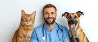 Smiling veterinarian in blue scrubs with stethoscope posing with ginger cat and mixed breed dog against white wall, friendly healthcare professional.