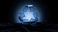 Blue glass recycling symbol with glowing effect on dark surface for environmental sustainability and eco-friendly waste management campaigns.