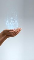 Human hands cupping glowing digital network icons with connecting lines and sparkles floating above palms against neutral background.