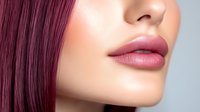 Close up view of plump pink glossy lips and smooth skin with burgundy hair against light background, beauty and cosmetics concept for makeup and skincare advertising.